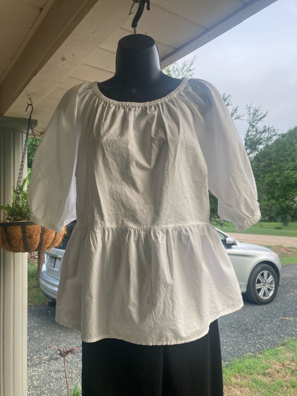 Old Navy White Peasant Peplum Blouse. P2P is 21”.